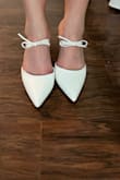 I would absolutely size up! The little strap on top is snug. I typically wear an 8 (sometimes a 7.5 in heels). I got an 8.5 and they are perfect. Size up, but definitely get these. So cute! I'm wearing them with the bow on top of my foot when we elope. (I'm going to tie the bow better, this is just after I opened the box and tried them on)
I've been stressed over what shoes to get since my dress has a tulip skirt and my shoes will be showing.. visible wedding shoes can make or break the look you're going for. These are making it! The perfect touch to my simple dress. - Kandace M.