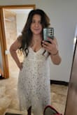 Wore this for my BSN graduation. The lace is so pretty and the dress is sexy yet classy. Not stretchy, true to size. Chest area fit perfectly (40C). You can control how much/little cleavage you show by adjusting straps. - Barbara A.
