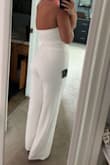 I ordered this for my graduation, I ordered a M and it fits like a glove. It hugs your curves at all the right places & it's super stretchy which makes it very comfortable! I will be purchasing this is more colors for more events! - Ella P.