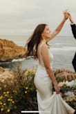 I ordered this dress for my wedding after I decided I didnt love the one I bought from a bridal store. I usually order a small but saw a ton of people my size ordered xs and Im so glad I did it fit like a glove! I cant believe I got it for the cost it was and got soooo many compliments. The low back and train and satin is perfect. It obviously needs steamed but I steamed it myself and it came out perfect. - Callista V.