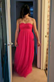 I am running out of ways to say how beautiful the things we get from Lulus are. The hot pink color is a more saturated pink, not a bright bubblegum pink. It has several layers of tulle. The layer under the top has bright sparkles on it, but because it is covered by the top layer of tulle the sparkles are more subtle, they don't scream at you. We did end up returning it because the torso of the dress seemed a little short for my daughter who is almost 5 ft 8 and sat above her waistline, and she prefers dresses that sit at and accentuate her waist. The dress was very lightweight and pleasant to the touch, the tulle was soft, not still, and moved very well. - Lidia R.