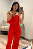 Such a cute well-fitting jumpsuit! It did require hemming, but other than that I wouldn't change a thing. Made my booty pop and the material is nice. - Ariana M.