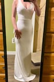 I read the reviews and that was the most helpful, the site suggested ordering a small but looking at women with similar measurements recommending the xs. I'm so glad I ordered down! Fits perfectly my boobs are popping &and gives me a good excuse to not wear any knickers on the day. - Morgan L.