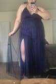 I love the dress. It looks exactly as pictured. When I got it though, I had to make adjustments to the leg slits. The slits came up so far that my underwear were showing. I had to sow up the slits about 5 inches to not show my panties. Once I did that, it was perfect! - Gwendalyn P.