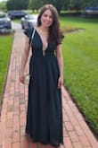 This dress wears beautifully. Sexy without being distracting. I wore it to the symphony and got lots of compliments. Required double sided dress tape to keep the shoulders properly placed. - Meredith J.
