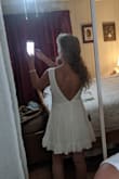 This simple white dress is flowy and soft yet has classic appeal. Perfect for a spring soiree. - Tasha G.