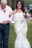 This dress is beautiful! Fits true to size and is so flattering! - Katina Q.