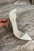 These are gorgeous! I am wearing them for my wedding day and they are absolutely stunning. I was nervous about the clear plastic rubbing blisters, but was pleasantly surprised by how soft the plastic was. Very pleased! - Julia M.