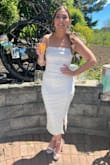 Honestly, beyond happy with this dress. I got it for my bridal shower and got so many comments on it. Nothing bad to say at all. Shoes in photo are also Lulu - Tara C.