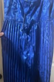 Really pretty dress, fit well. I'm 5'4" about 140lbs and ordered a medium but like the other reviews said the stitching was all messed up by the zipper. Had to return - Laura R.