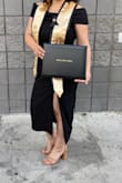 Fit perfectly. Not too tight or loose. Wore a faja. I'm short so it fit just above the ankles. Was a little tight to lift arms and down. Perfect for graduation. - Jasmine R.