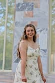 I got this for my college graduation and it was perfect! It fits true to size (I am 5'10, 170 pounds, somewhat curvy/ pear shaped and I got a Large). It's so comfortable and super cute in pictures, especially for a little swishing the skirt picture action shot! It was very flattering, good quality, and I am super happy about it. - Anna B.