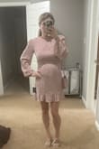 Bought this dress in size small and it was tight around the ribs where it zips to; I was 19 weeks pregnant though so I should have sized up. Otherwise there was room in the belly and it was very cute for date night. - Jacque L.