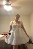 I am between a large/xl because of my bust size but this was a perfect fit! I am only returning because it does not match the vibes of my engagement shoot. I also thought the material would be more light but it's thicker and hotter and my pics are in June. - Katie A.