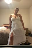 I am between a large and an xl and I got it in an xl. It fits perfectly! I am planning on wearing it for my bridal shower! - Katie A.