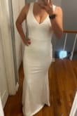 I absolutely fell in love with this dress the moment I tried it on. After going to two bridal stores and ordering another dress from Lulus, I finally found my wedding dress. I went with the size that the Size Quiz told me which was an XS and I wouldn't change a thing. Everything about this dress is amazing! Definitely a great buy! Can't wait to wear it! - Caitlin H.