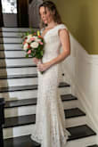 This dress fit beautifully. It felt like an expensive designer dress and was perfect for our wedding day. - Jill D.