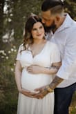 The dress was beautiful! I followed the sizing recommendations of Lulus (L where I normally order a medium) and it fit perfect for my maternity photos! I'm petite so the dress was a little long and I needed a taller wedge heel, but it made my photos look great! The linen fabric does wrinkle, so you will want to steam it out, but it was soft and well made. Plan to hem and wear all summer! - Sidney H.