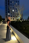 I ordered this dress in an xtra small and it fit perfectly. It was a teeny bit too long but it draped beautifully when standing. This dress was so elegant and comfortable. I absolutely loved everything about it! It was delivered before the delivery date. Which was a plus. - Jeanene C.