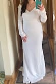I ordered a couple dresses and ended up picking this one for my elopement in October. The fabric is nice and thick, great quality. Sleeves are a little long on me so I will be getting them hemmed a bit as well as the bottom but size wise, this is a perfect and I'd say true to size! - Leah H.