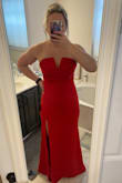 Love the look of this dress. I also bought a small but could zip it up my upper back and it was pretty snug above the slit. Medium was the right way to go! im able to wear a strapless bra without it showing. The wires in the front did a little but nothing uncomfortable - Tara Y.