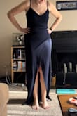 Decent dress! But the slit is like a center slit, and I was looking for more of a side slit. - Abigail H.