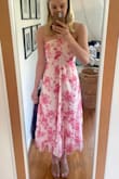 This dress is so beautiful and fits well. The only note I have would be that the bust is a little tight, I am a 34C for reference, the cinch does stretch but my chest is snug. Overall, I love this dress and am so glad I got !!! - Madison M.