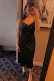 This dress is absolutely stunning! Fits perfectly and is extremely flattering. - Carlee