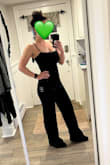 Great jumpsuit! Awesome find on sale too. Though I normally wear a size S in all clothes on this site I think the XS is still workable on my frame. (S and M were sold out) I hope they bring this one back in more colors, I'd love a purple or black one!
The green velvet is very dark which is actually perfect since I was having trouble finding a black jumpsuit that I liked. Looks beautifully green in bright light though. It's also double lined which is great. Velvet is usually a winter fabric for some reason but is totally freezing to wear lol so that'll help if I wear to Christmas parties, etc. Good chest support and fit too, no need for a bra, or could get away with a bandeau if you want.
I always need to get things hemmed due to my petite stature, so if you're on the shorter side you will too. - Alix B.