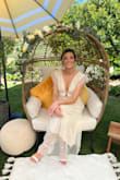 I recently wore this dress to my bridal shower and it was an absolute showstopper! I received endless compliments throughout the day and felt like an absolute princess in this stunning dress. First off, the cream Swiss dot fabric is so elegant and feminine. The delicate texture of the fabric is simply beautiful, and the ruffles add just the right amount of sweetness and romance. The midi length is also perfect for creating a chic and sophisticated look. What I love most about this dress is how comfortable it is to wear. The fabric is lightweight and breezy, which makes it perfect for warm weather. Plus, the lining ensures that it's not see-through, which is always a concern with lighter-colored dresses. The fit of the dress is also amazing. The cinched waist and flowing skirt are so flattering! Overall, I would highly recommend the Yours Evermore Cream Swiss Dot Ruffled Midi Dress to anyone looking for a beautiful, comfortable, and elegant dress for a special occasion! - Debbie S.
