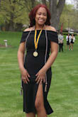 I picked this dress for my college graduation ceremony and let me just say, I LOVED IT!!! it fit me soo nicely! I barely had to readjust myself shoulder wise due to its features and though it felt a little restrictive at times, it wasn't anything too serious. I would rather have a shoulder dress where the shoulders stay in place then constantly readjusting throughout the event. Also the slit!! it was definitely giving!! Definitely would recommend for a formal event!! - Jadon H.
