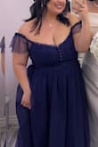 Wore this for my sisters wedding and it was perfect!! Received so many compliments all night. I'm 5'0" so it was more like a maxi dress on me lol. Only negative is how tight the arms were. - Mia L.