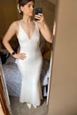 This fits me so well! It was stretchy on the hips which I appreciate because I don't have a ten inch difference between my hips and waist like almost all designers rely on to create bottoms.
It is super sexy and classy, and it is not transparent. FYI this dress is more of an ivory colour and not white. - Michelle D.