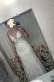 I really wanted this dress to work and ended up trying two sizes of it (pictured in size 10). Unfortunately, it just does not allow for hips. This dress was beautiful and a good quality but too small in the hips for me. - Rayna N.
