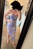 This is a great dress. The material is stretchy so even though it's form fitting it's very comfortable. I technically could have probably worn an XS if I had wanted it to be even more snug of a fit, there was definitely wiggle room in the small but not necessarily in a bad way. Overall very comfortable and high quality, I wore to a Kentucky Derby party but plan to wear again for weddings this summer. - Andrea V.