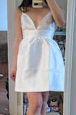 The quality of this dress is really good and it looks exactly like the listing! XS is a tiny bit tight on me just on the band area below the bust but it zipped up all the way and I prefer getting XS for most clothes due to my nonexistent chest. Straps are fully adjustable! - Annie T.