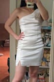 This dress is really cute but the shoulder bow definitely needs ironing/smoothing out before wear but even then I thought it flopped weird on the side. Great quality though!
NOT for flat-as-a-board chests like mine unless you have a really good strapless or stick-on bra. - Annie T.