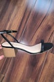 I love the low heel on the sandal, very versatile in the aspect of the places you can wear them. I got them to elevate my casual wear and I pair them with jeans or a nice pair of trousers. The strap fits a little loosely around the ankle but the size fit is true to size. I can walk all day in them the heel doesn't hurt my feet. - Sinthya R.