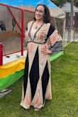 I'm 5'1" so I had to have the entire pattern on the bottom hemmed. I also wore a camisole under it for a little coverage for my college graduation. I absolutely love this dress. It's so beautiful on and very comfortable. - Nina C.