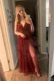 I bought this to celebrate my fiancé's & my anniversary this year and it was perfect! Fit me well and is definitely a showstopper. It was a little bit long so if I wasn't wearing it for anything other than a dinner I'd probably need to get it hemmed. The slits are also pretty high so be aware of that when you're moving around. - Amber S.