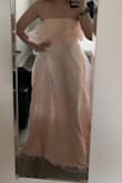 Based on previous reviews, I decided to order a medium. I'm usually between a small or a medium, so went for medium and it fit perfect. The color is so pretty and the top layer or material adds a little shine. I'm wearing it for my wedding. :) - Natalie W.