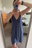 Super cute dress, so soft and the color is beautiful. It runs a little big and the crisscross straps are loose. Also came stained - Alison L.