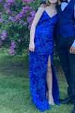 a very lovely dress. very vibrant color. fits well
only "bad" thing is that it's a little bit uncomfy to sit in. When sitting, it was a little tight around my thighs. some of the threads of the slit pulled from sitting down - Evangelina M.