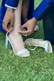 this was my first pair of heels, so keep that in mind.
i ordered a 7.5 but definitely would order a 7 next time, because for my toes to sit properly into the shoe i had around a half inch of space at the heel
decently comfortable to walk around in, but not really a comfortable shoe to dance in and i took it off after 45 mins of dancing - Evangelina M.