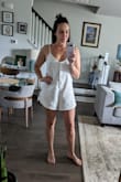Really love this romper. I use it as a beach cover-up but also for around the house. Super cute! It's so comfortable and easy to wear. I usually wear a large, but I sized down so it wouldn't be too baggy. - Nicole U.