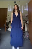 I love the dress, but of all of the dresses that I ordered this fit the smallest. It is a struggle to get it zipped up over the "waistband", and while I know that sometimes happens I'm scared I'll rip it every time I wear it. I'm usually in between a small and a medium, leaning towards a medium, and I honestly thought about exchanging it for a large but I didn't. It is super cute and I will be keeping it, just figured I would mention that it runs a little small :) - Ana L.