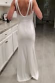 I can't say enough about this dress. It is simple, elegant and flattering. I DO have padded inserts in the bust because I'm flat chested. Also it is not very forgiving so I would recommend spanx. - Angela D.