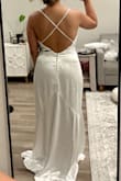 The back of the dress was the sole reason I gave this dress a shot, but it wasn't as nice on my body as I would've hoped. It was obviously too long because I'm short, but the cowl neck style just wasn't flattering. I ended up returning - Monica S.