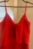 The stitching was sewn across the back of the dress making a weird pleat on one side. - Daniella