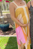 This dress is so beautiful and breathable! I am 26 weeks pregnant and the size small fit perfectly. - Jazmin P.
